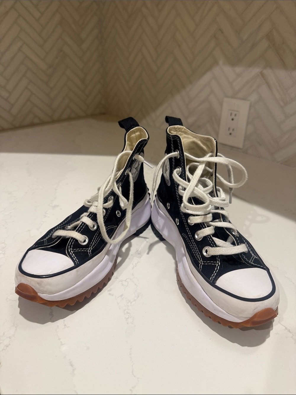 Converse Black and White High-Top Chuck Taylor Sneakers